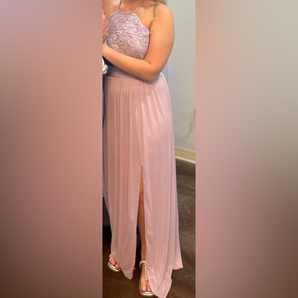 Size 10 women’s ￼David‘s bridal long dress the color is Iris ￼
